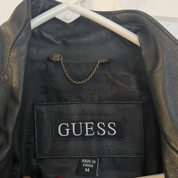 Gently used Guess black leather jacket. Size M zippered sleeves - Picture 8 of 9